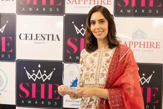 Dr. Farah Ahmed at an award ceremony