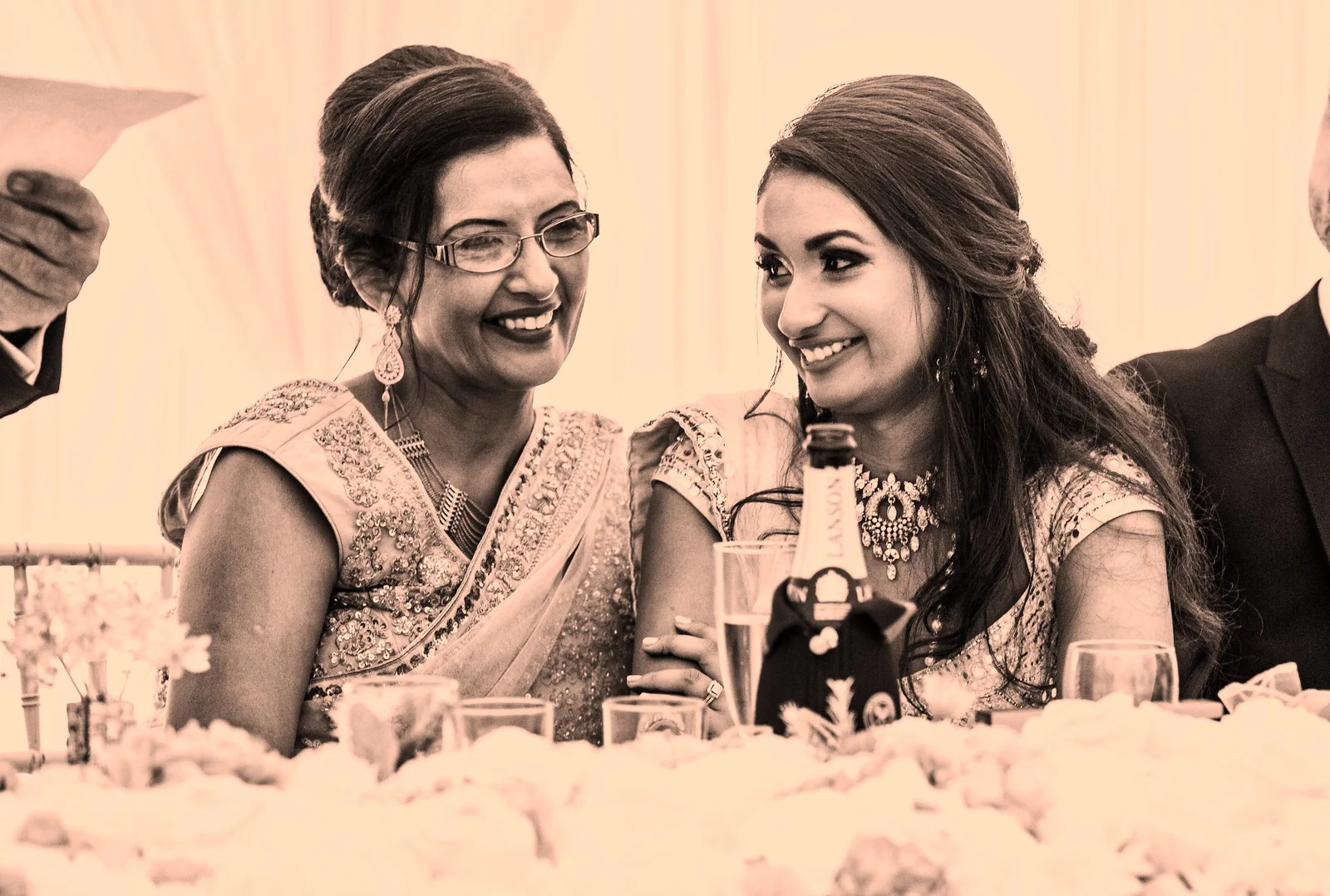 Divpreet and her mother at her wedding, laughing together